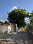 a dirt track leading to Kalyssa Bungalow